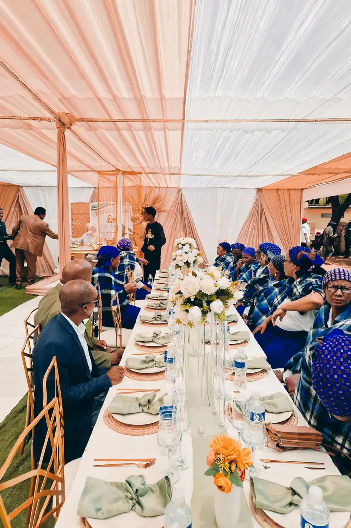 A long table reception in a tent